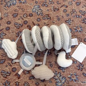 Gray and White Baby Stroller Activity Toy